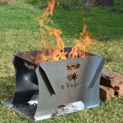 Coast RV Portable 400mm Firepit with Ember Tray Kit alight with a campfire